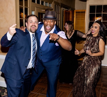 Four guests dancing